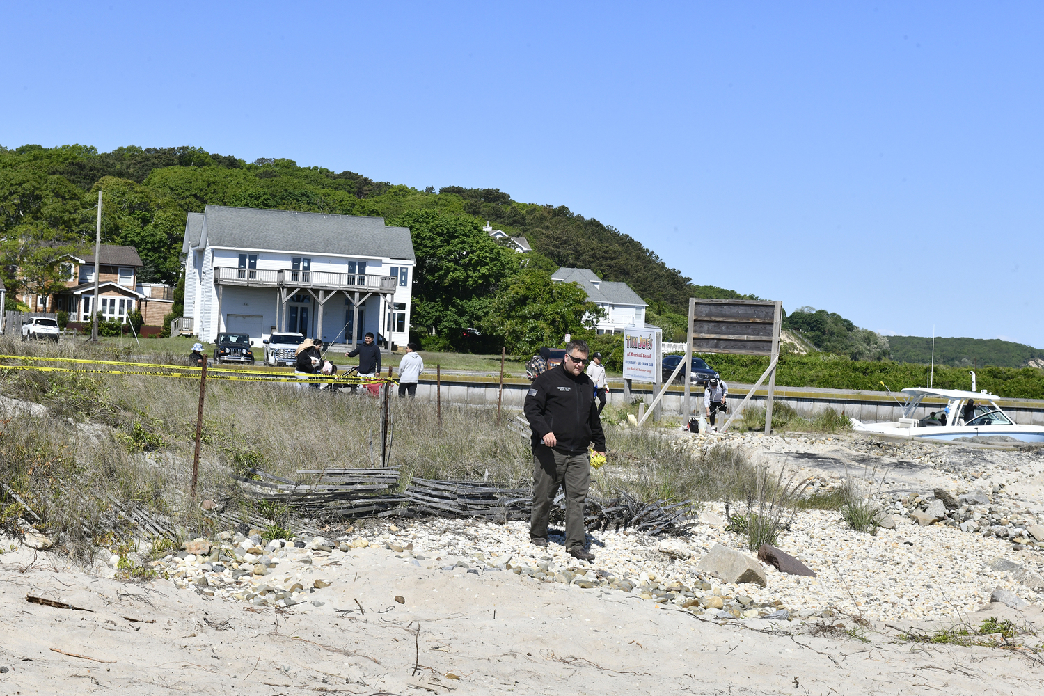 The 33 foot Grady White was being removed from the beach at Meschutt Beach County Park on Monday morning. DANA SHAW