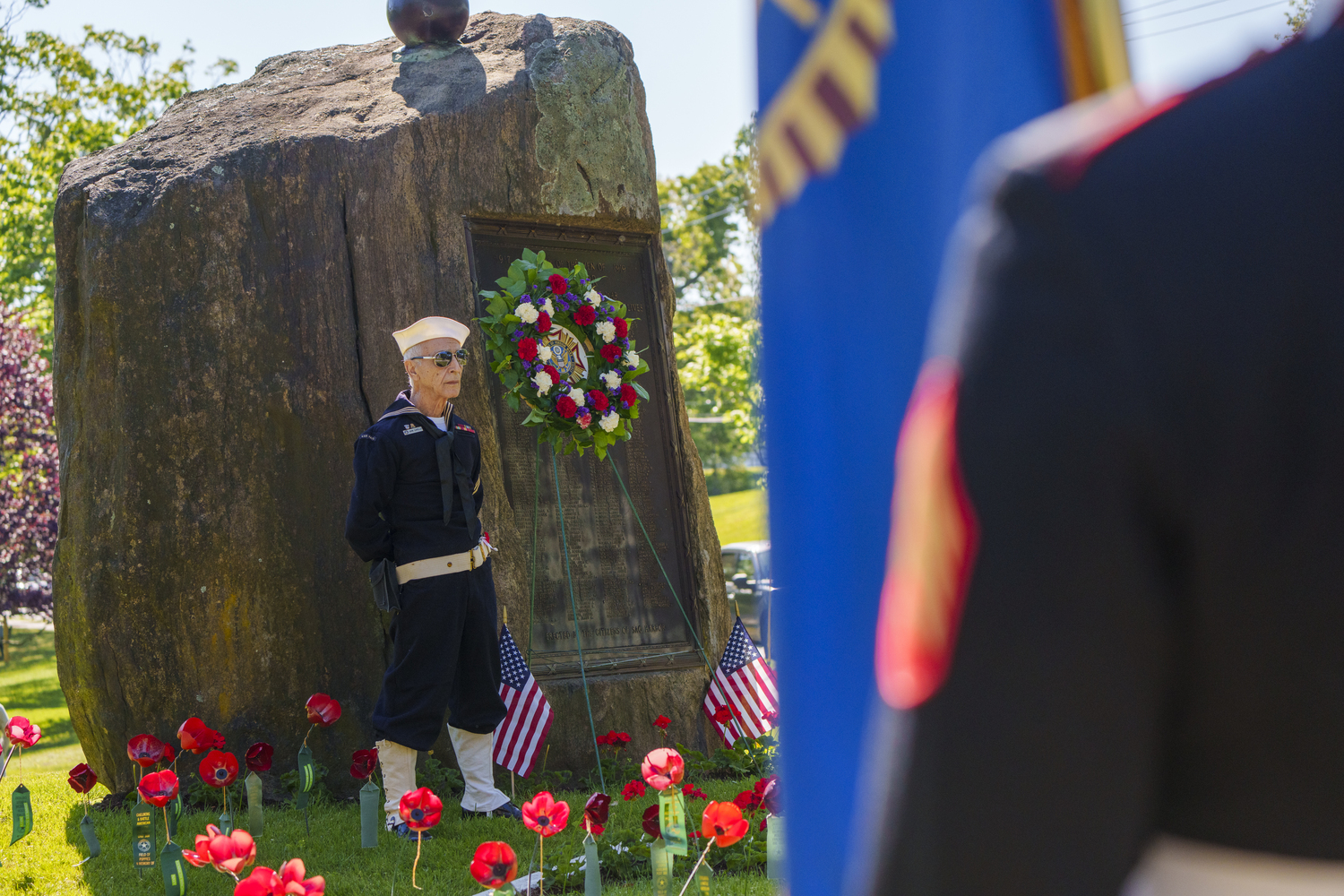 Navy veteran John Capello at Sag Harbor's World War I monument. LORI HAWKINS PHOTOS