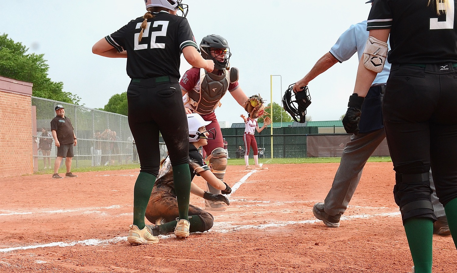Senior catcher Susie DiSunno makes a play at the plate for an out. KYRIL BROMLEY