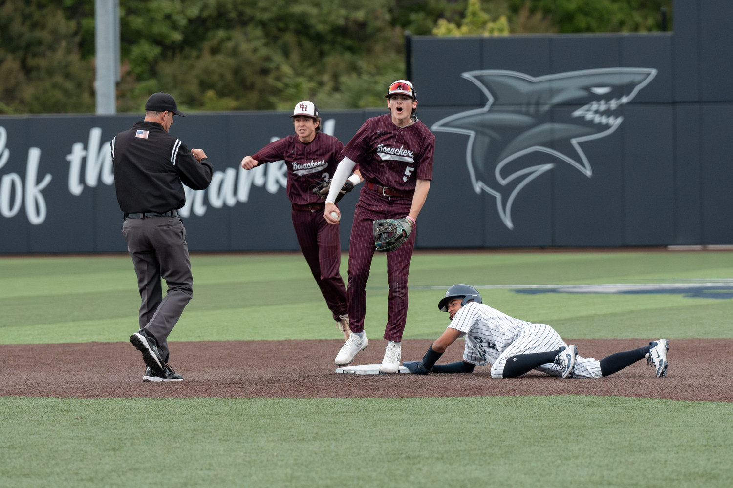 Hudson Meyer and Tyler Hansen after the Bonackers caught another ESM base runner trying to steal second base.   RON ESPOSITO