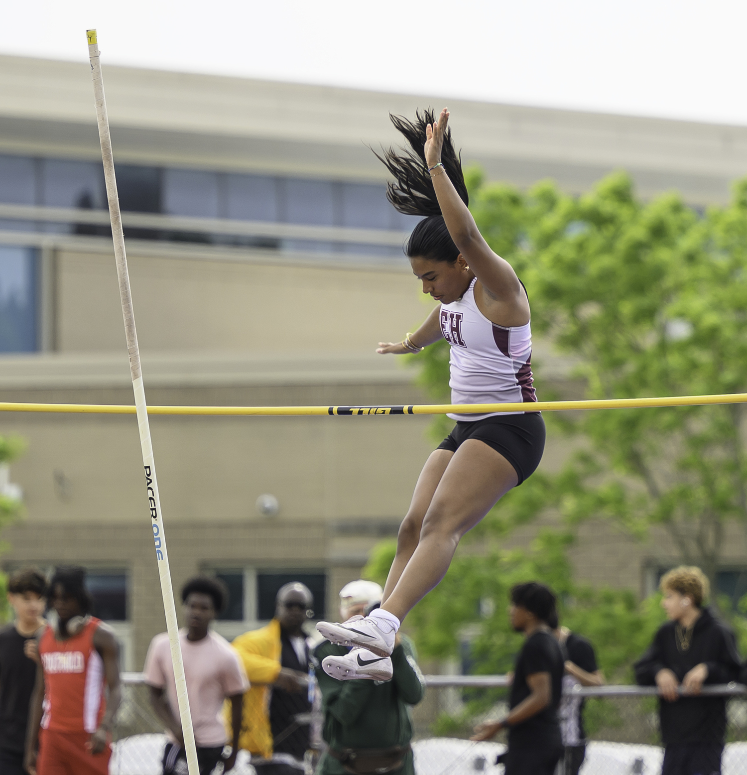 East Hampton senior Ali Muñoz in the pole vault.   MARIANNE BARNETT