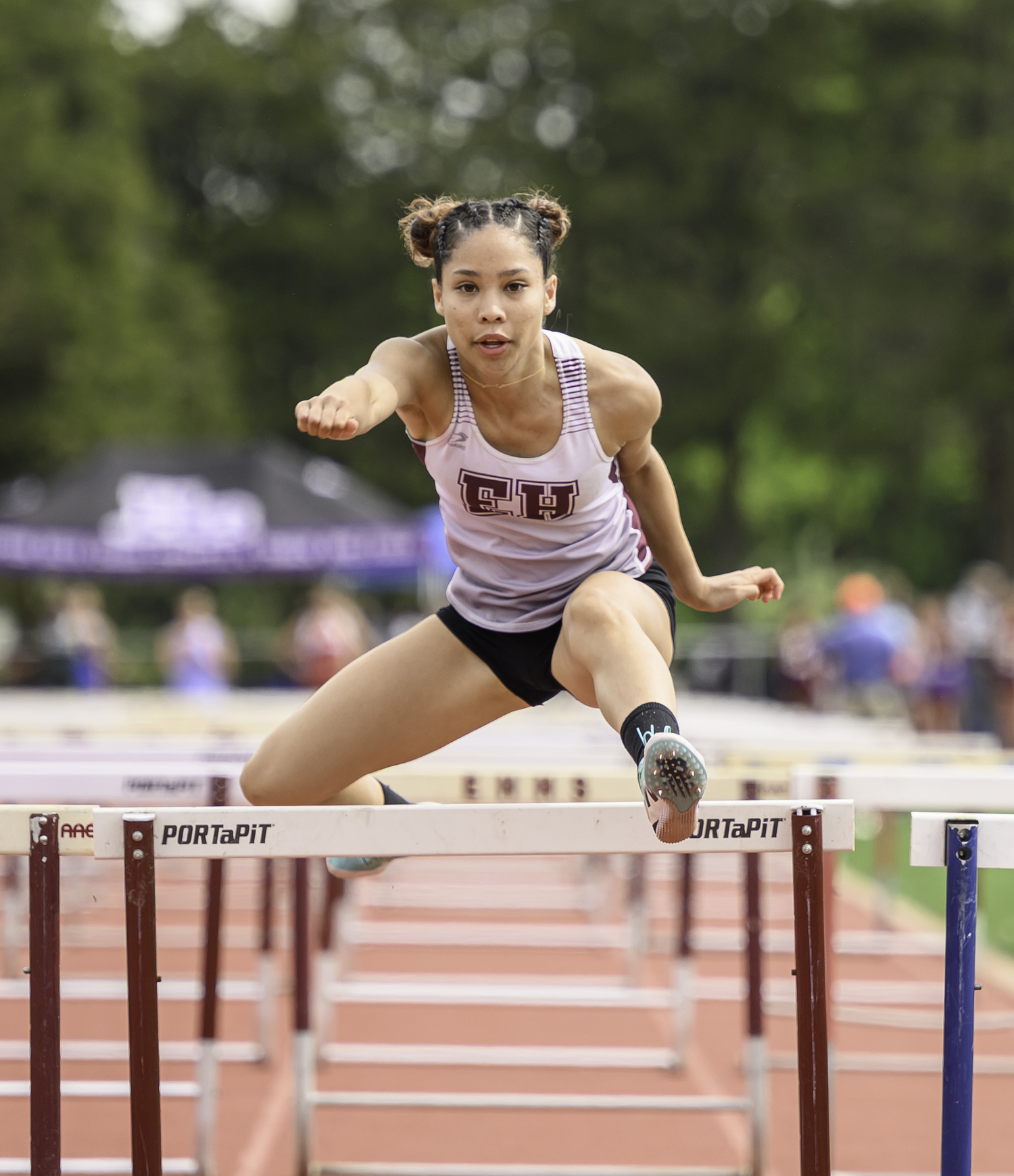 C.J. Echavarria won the 100-meter hurdles on Saturday.  MARIANNE BARNETT