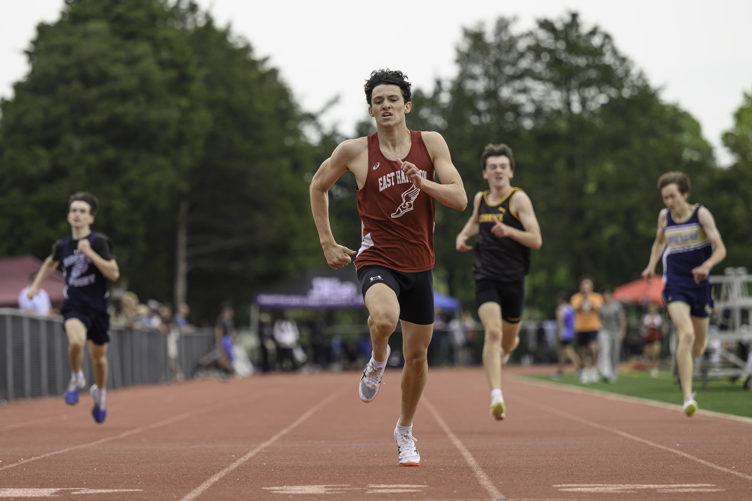 Liam Knight won his heat and placed 10th overall in the 400-meter dash.   MARIANNE BARNETT