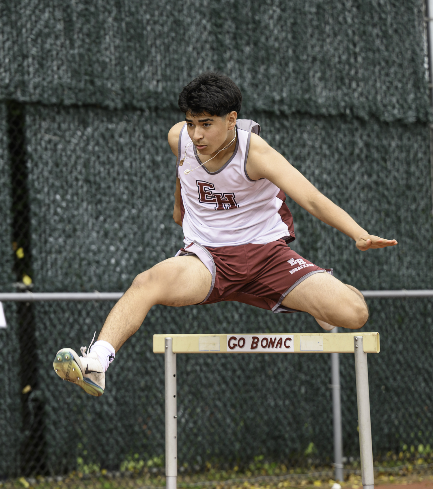 Marcus Oransky competing in the 400-meter hurdles for East Hampton. MARIANNE BARNETT