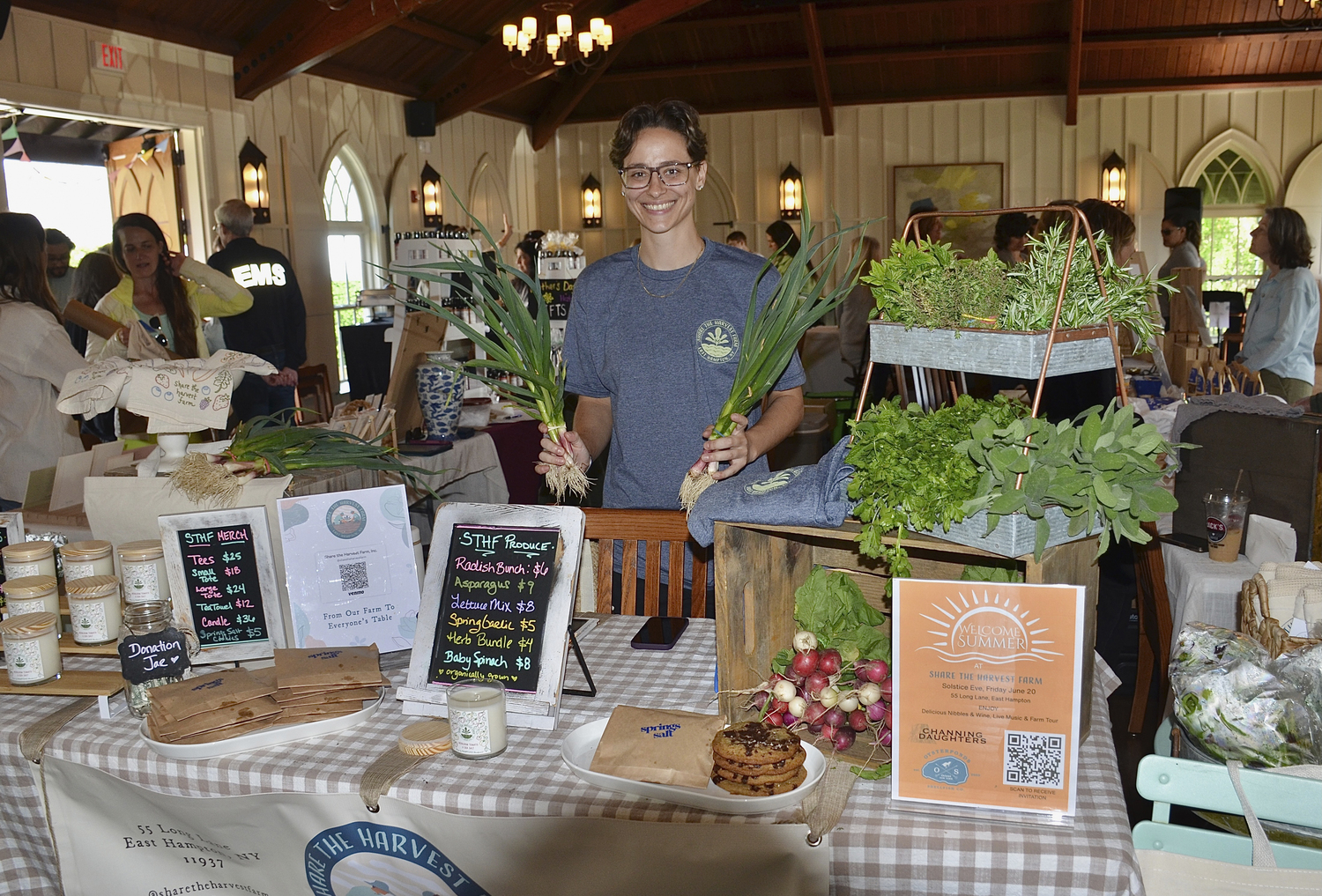 Jade Zaluski of Share the Harvest Farm at the Share the Harvest Farm spring market at the St. Luke's Episcopal Church's Hoie Hall on Saturday. KYRIL BROMLEY