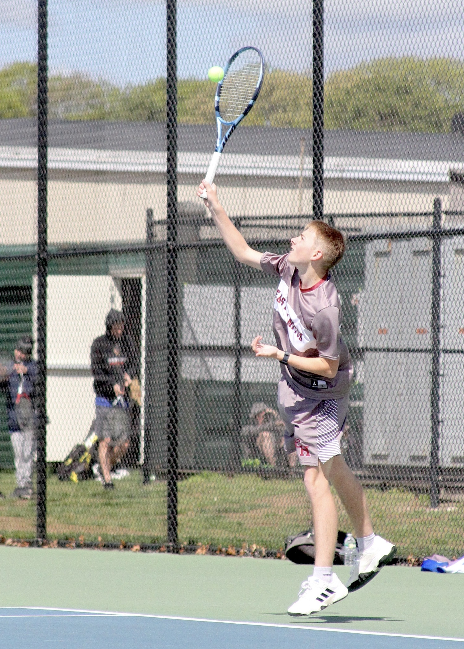 Junior Lucas Centalonza serves. DESIRÉE KEEGAN