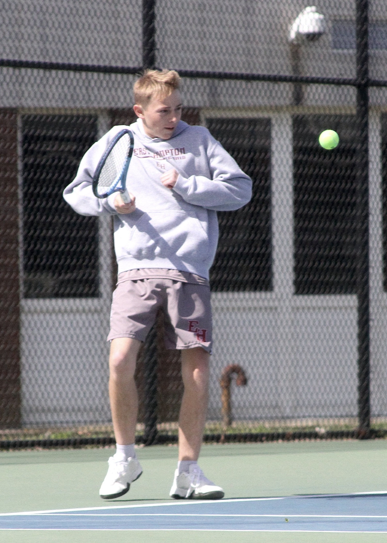 Junior Lucas Centalonza returns a serve. DESIRÉE KEEGAN