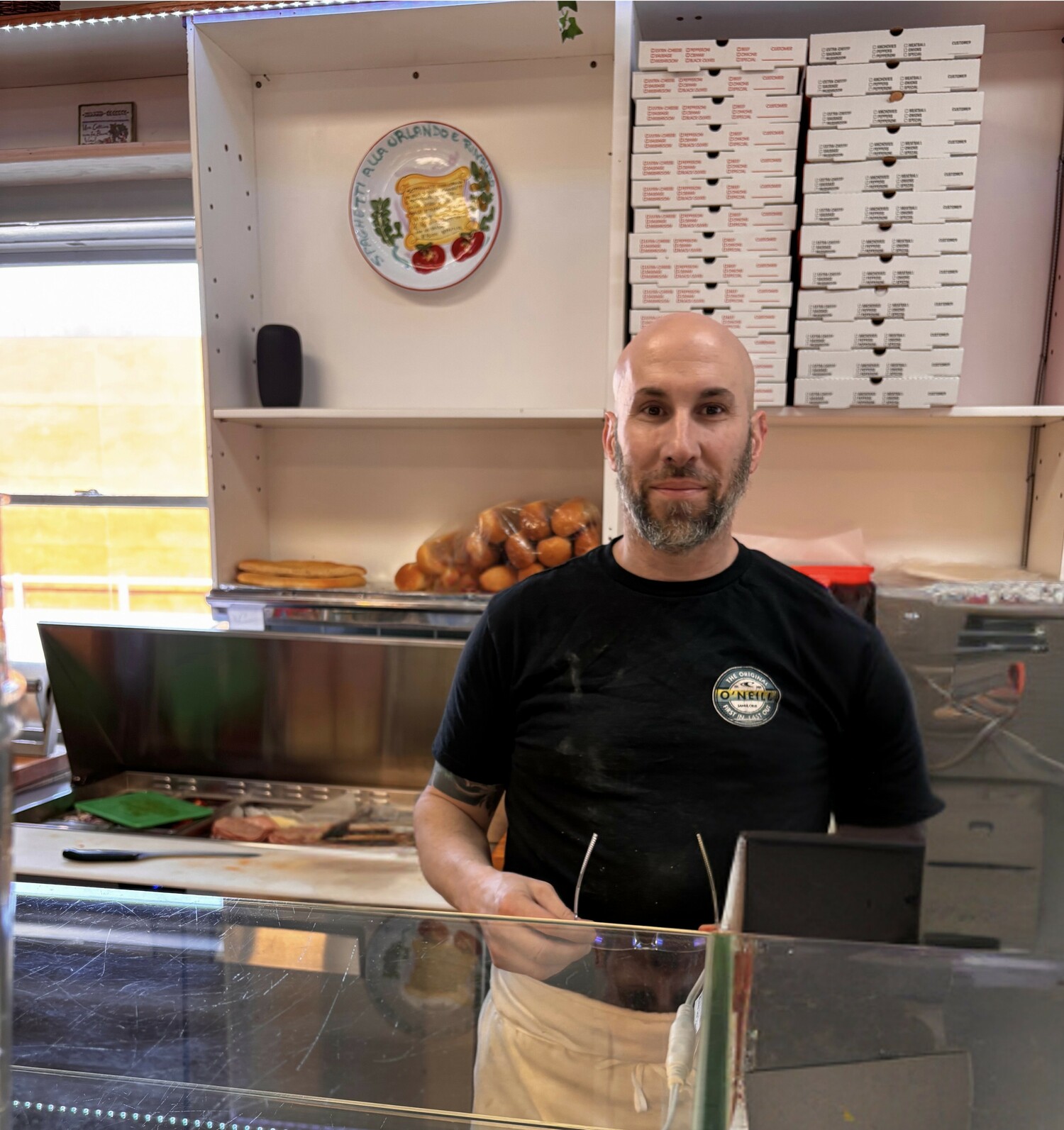 Frank Burriesci, owner of Luigi's Italian Specialties, had already noticed a price increase in avocados last month. BRADLEY RODRIGUEZ