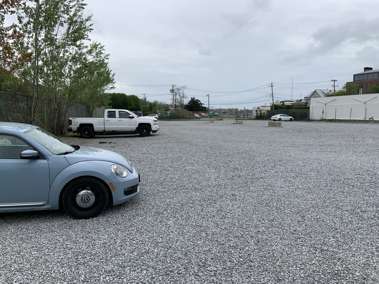 The gas ball parking lot in Sag Harbor was virtually deserted on Sunday, May 4, shortly after the village began to charge for parking there. STEPHEN J. KOTZ