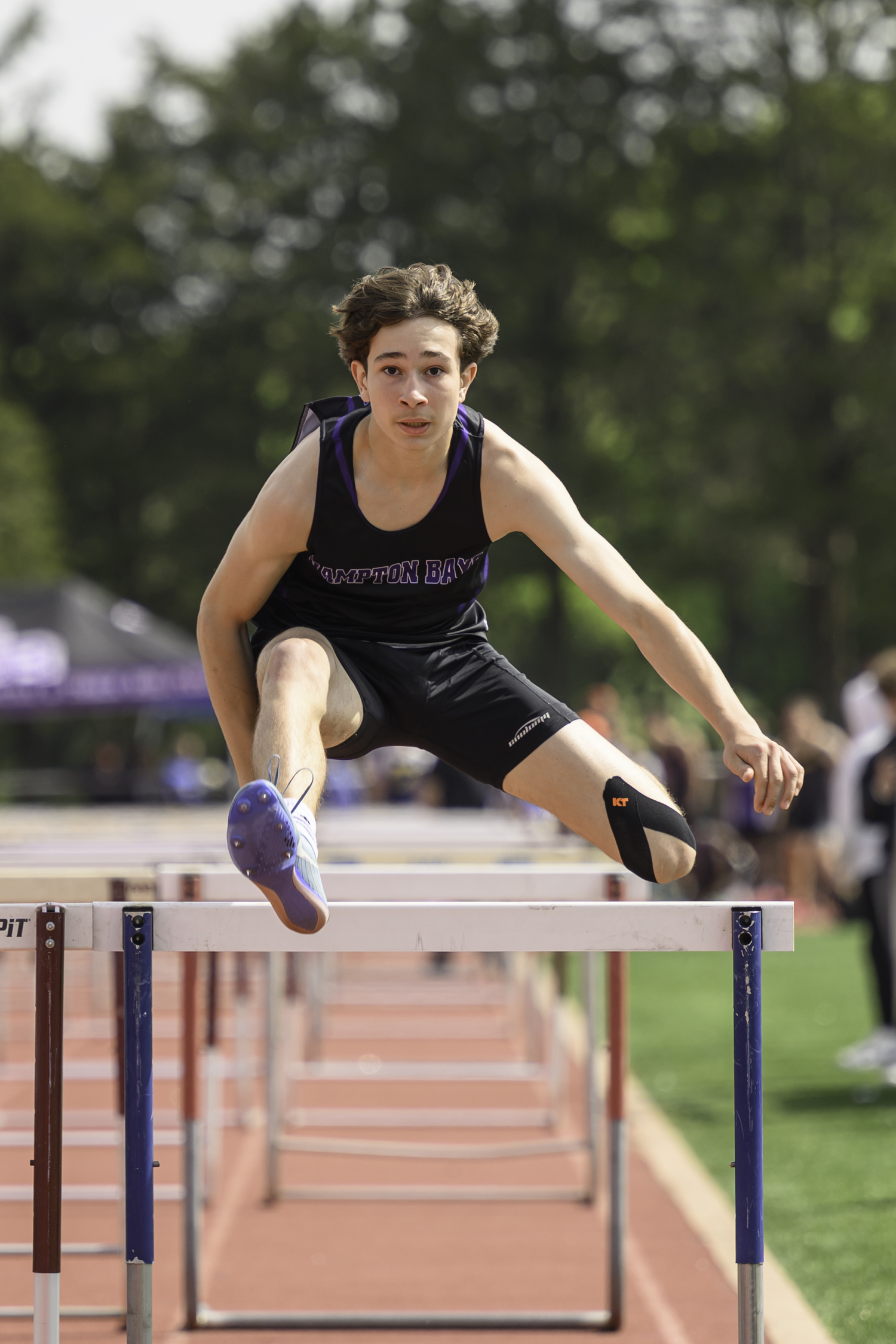 Hampton Bays freshman Daniel Pimenta in the 110-meter high hurdles. MARIANNE BARNETT