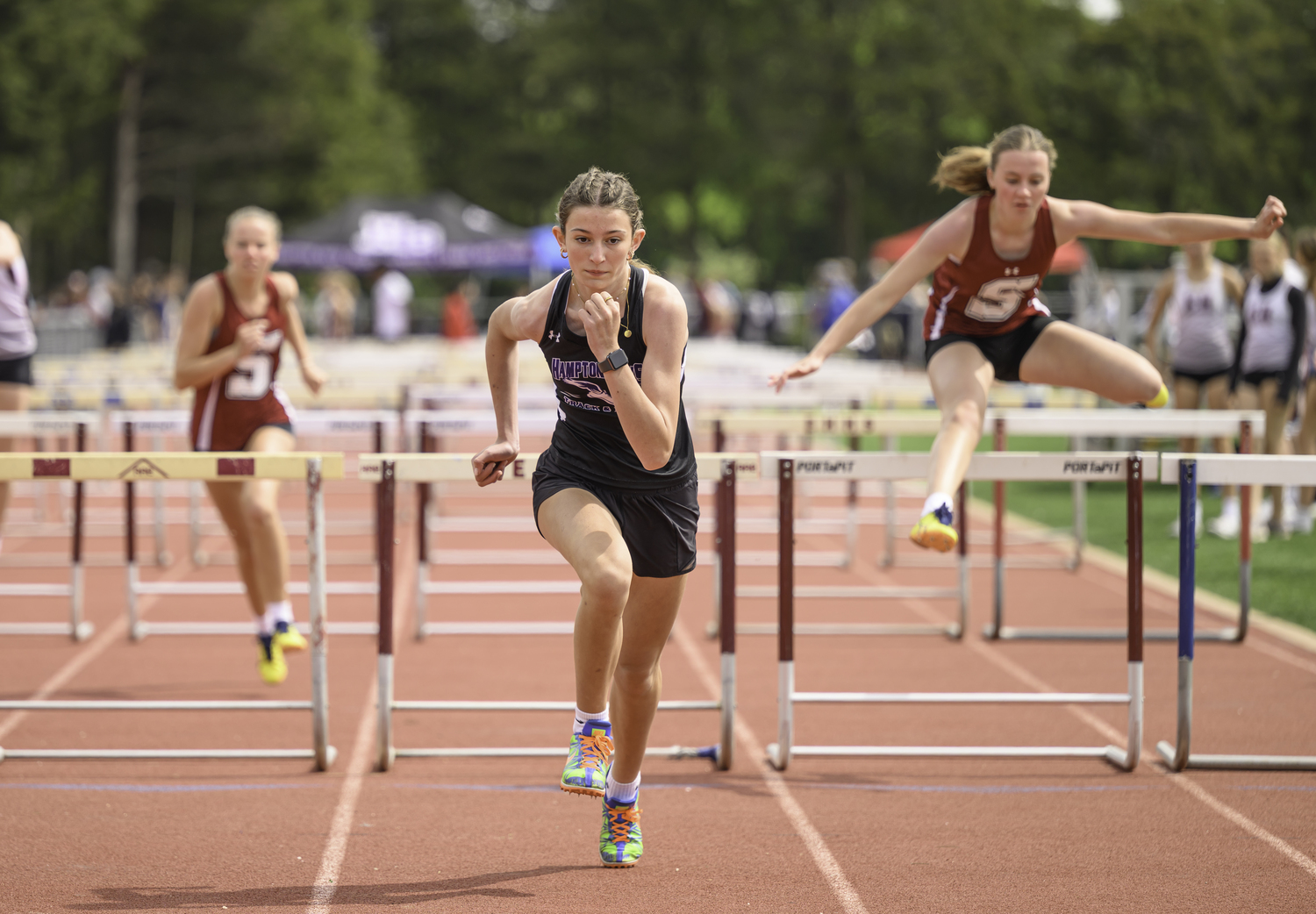 Eleanor Ramsay of Hampton Bays won her heat in the 100-meter hurdles.  MARIANNE BARNETT
