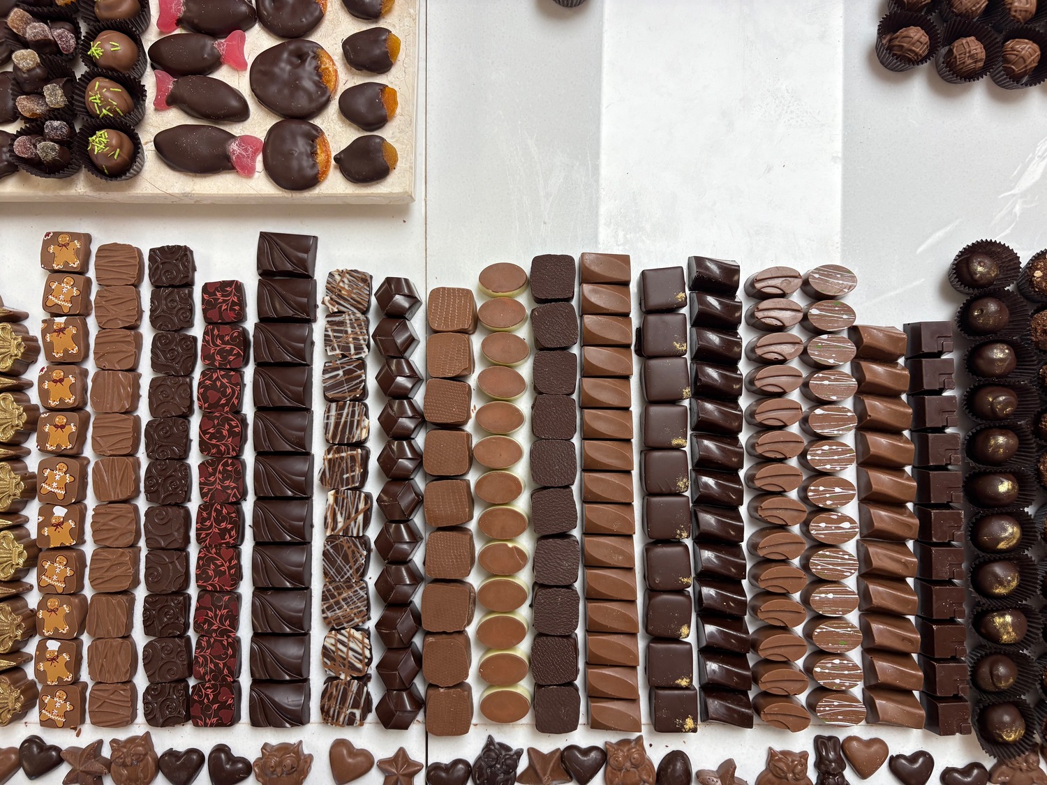 Rows of bonbons in lively shapes, colors, and designs await customers at both of North Fork Chocolate Company’s locations.