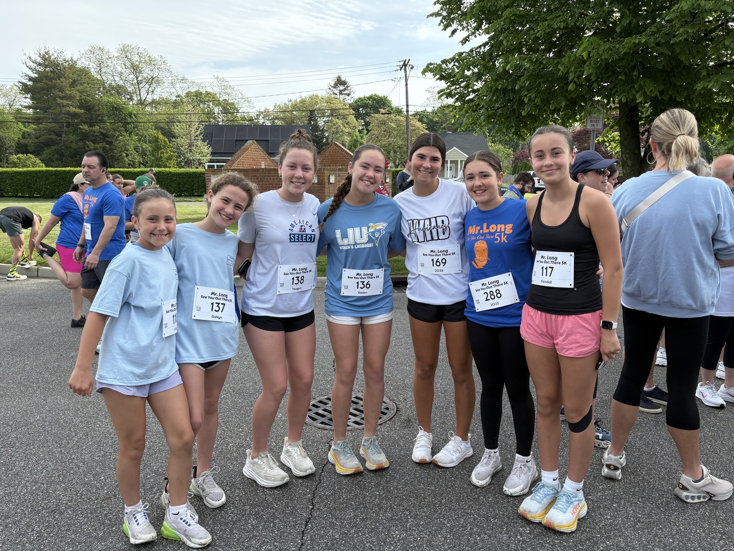 A group of current and former East Quogue School students at the start of the race. CAILIN RILEY