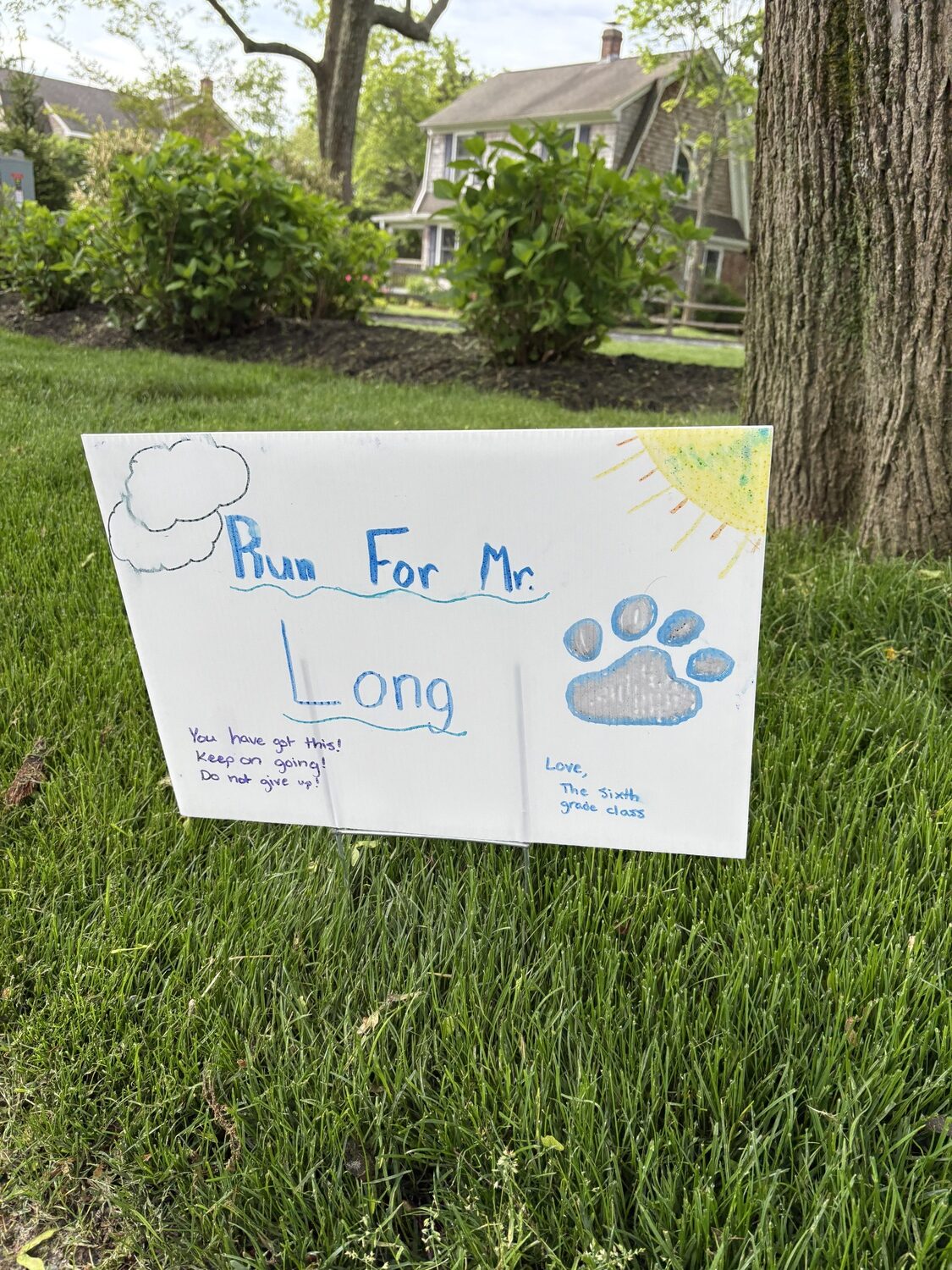 Many East Quogue families decorated to support runners along the route at the third annual Mr. Long 