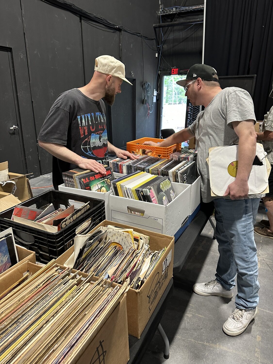 A customer checking out records at the first annual Hamptons Vinyl Record Fair. DAN STARK