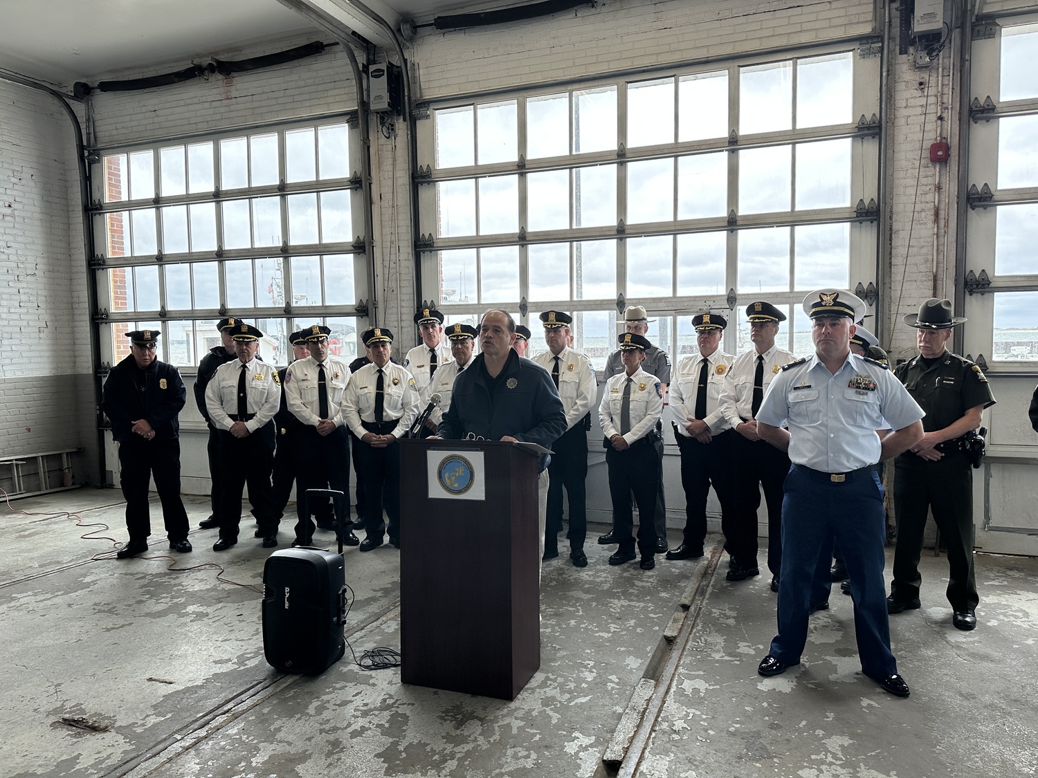 Suffolk Country District Attorney Raymond A. Tierney speaks at a press conference at Coast Guard Station Shinnecock on May 21. DAN STARK
