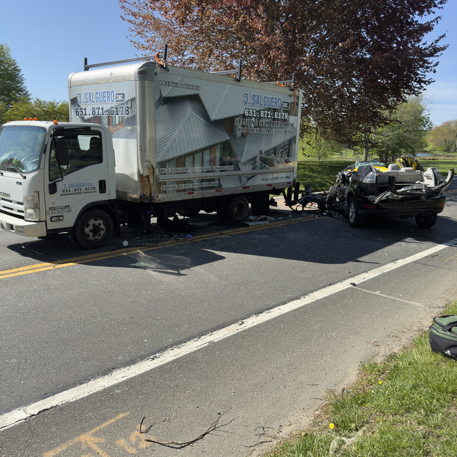 A delivery truck and passenger vehicle collided in East Hampton Village on Monday morning.  PHOTOS BY DOUG KUNTZ