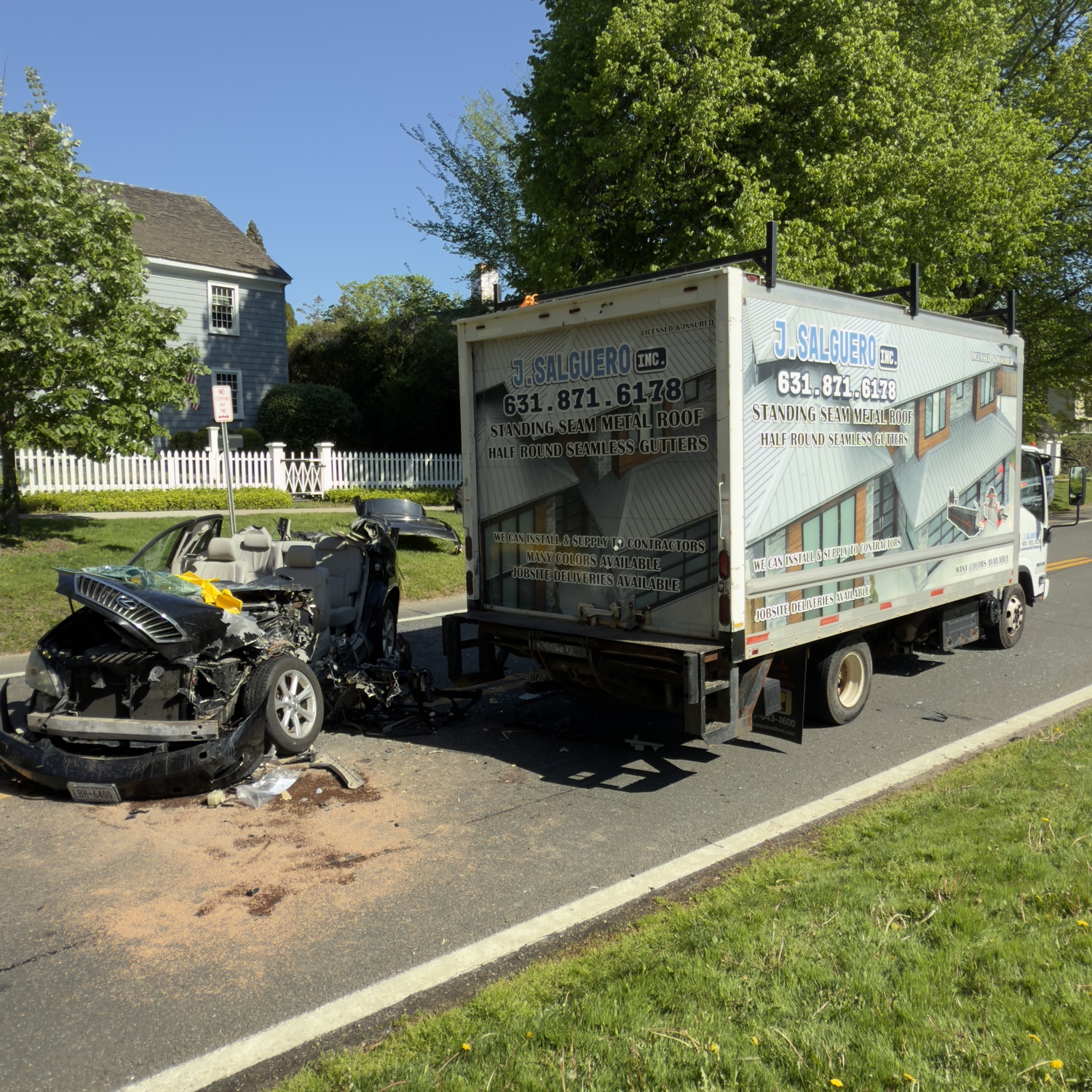 A delivery truck and passenger vehicle collided in East Hampton Village on Monday morning.  PHOTOS BY DOUG KUNTZ