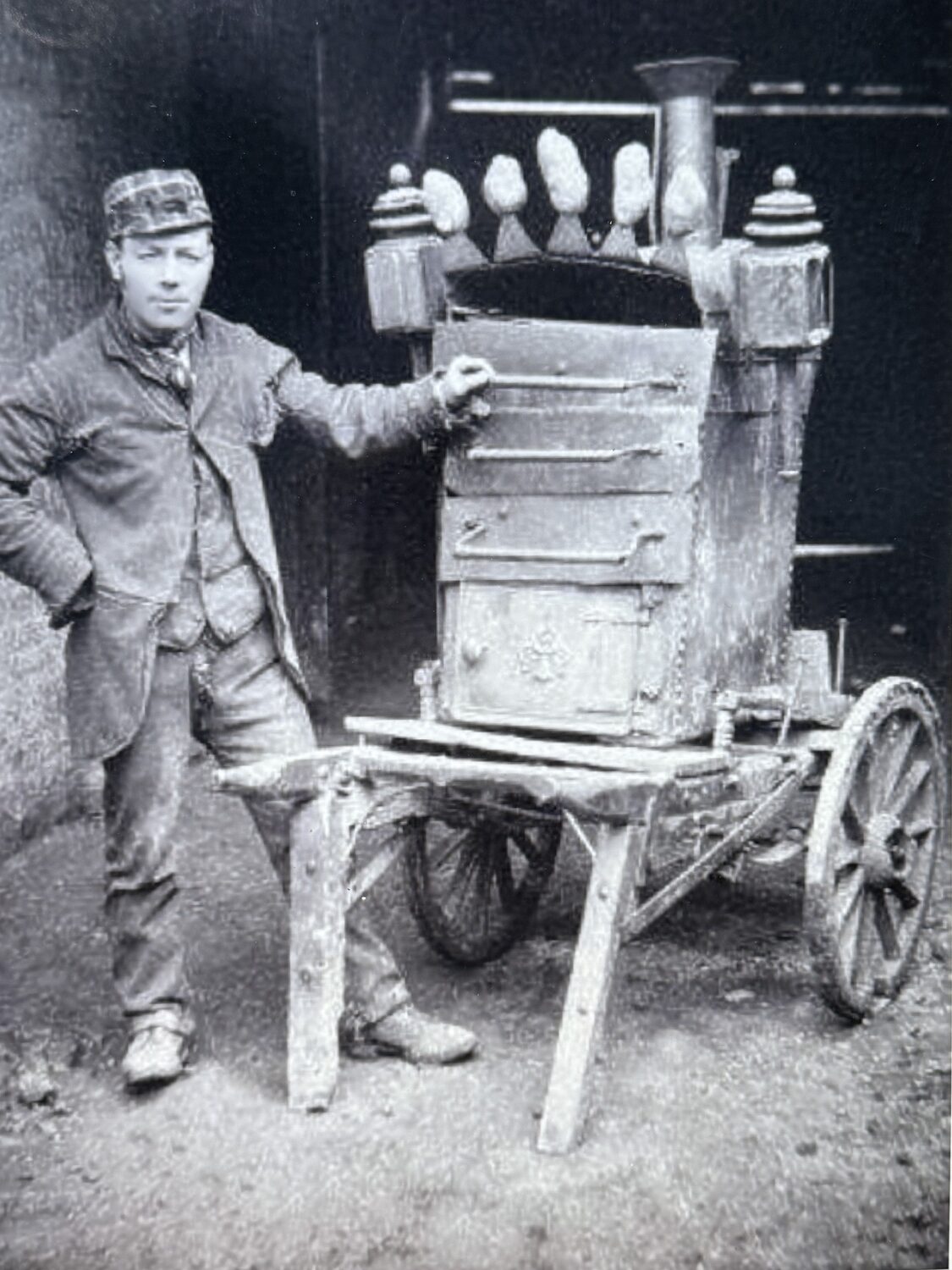 A hot potato vendor on the streets of Manhattan, circa 1892.