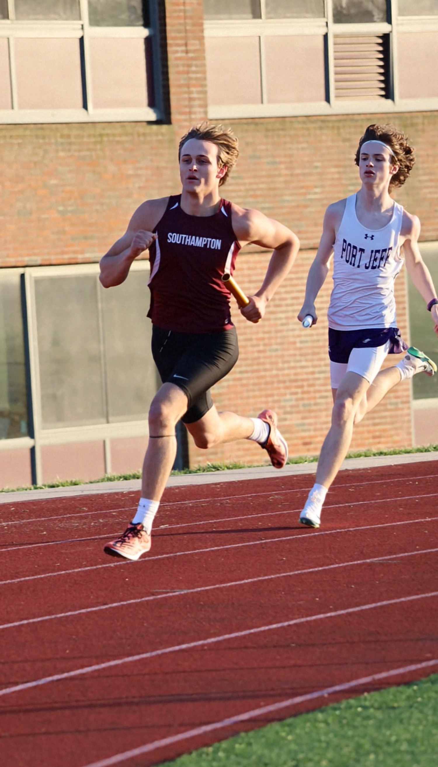 Hudson Fox running in a relay.  JAMIE CARLSEN