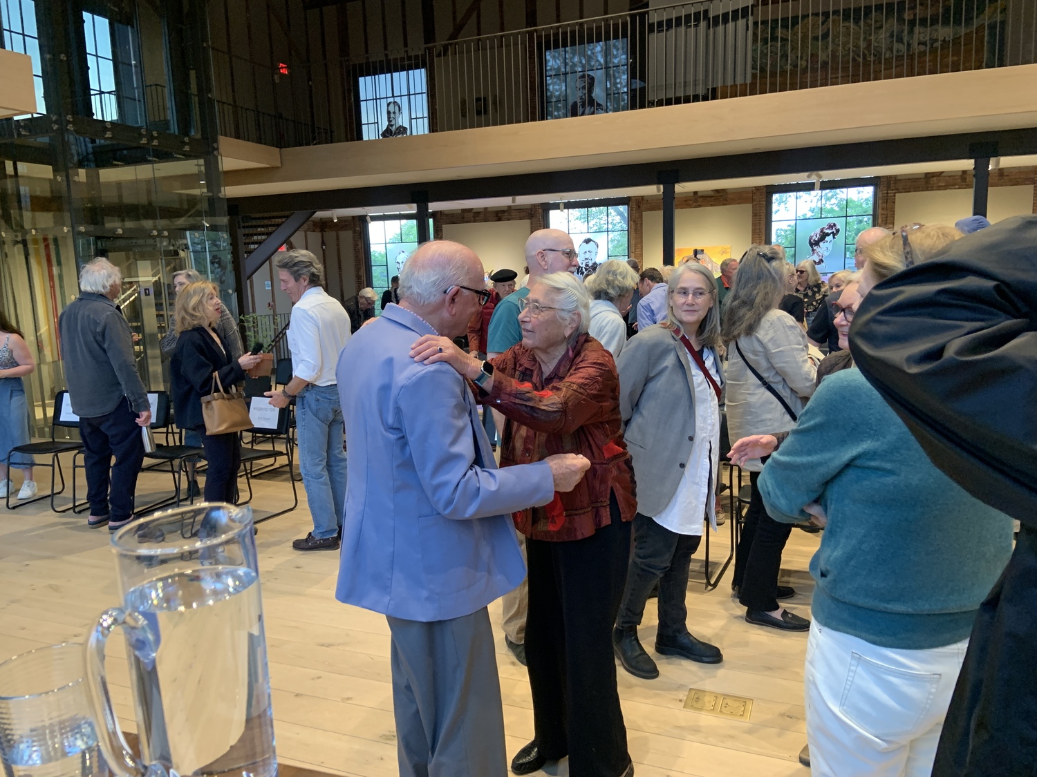 Nada Barry greeted well-wishers, including Jack Tagliasacchi, the owner of Il Capuccino restaurant in Sag Harbor, after her talk at The Church. STEPHEN J. KOTZ