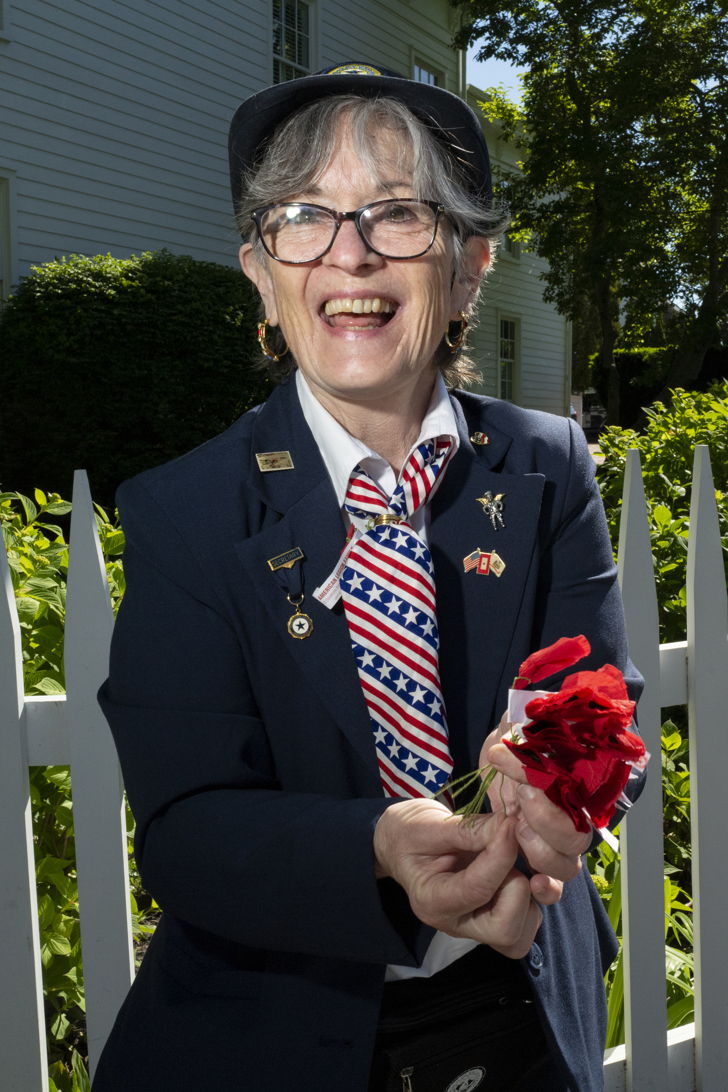 Jean Notturno, the chairwoman of the Sag Harbor Legion Auxiliary’s Poppy Program, was all smiles at the village's Memorial Day observance, LORI HAWKINS PHOTOS