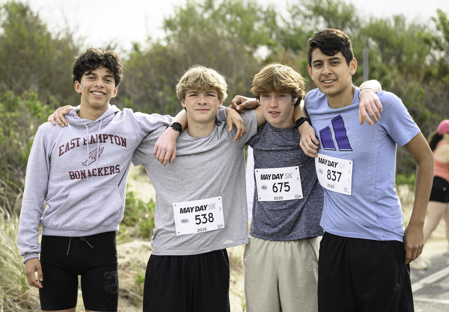 Edmar Gonzalez-Nateras, left, with friends and track teammates Jasper Samuelson, Watts Comly and Josiel Murillo.   MARIANNE BARNETT