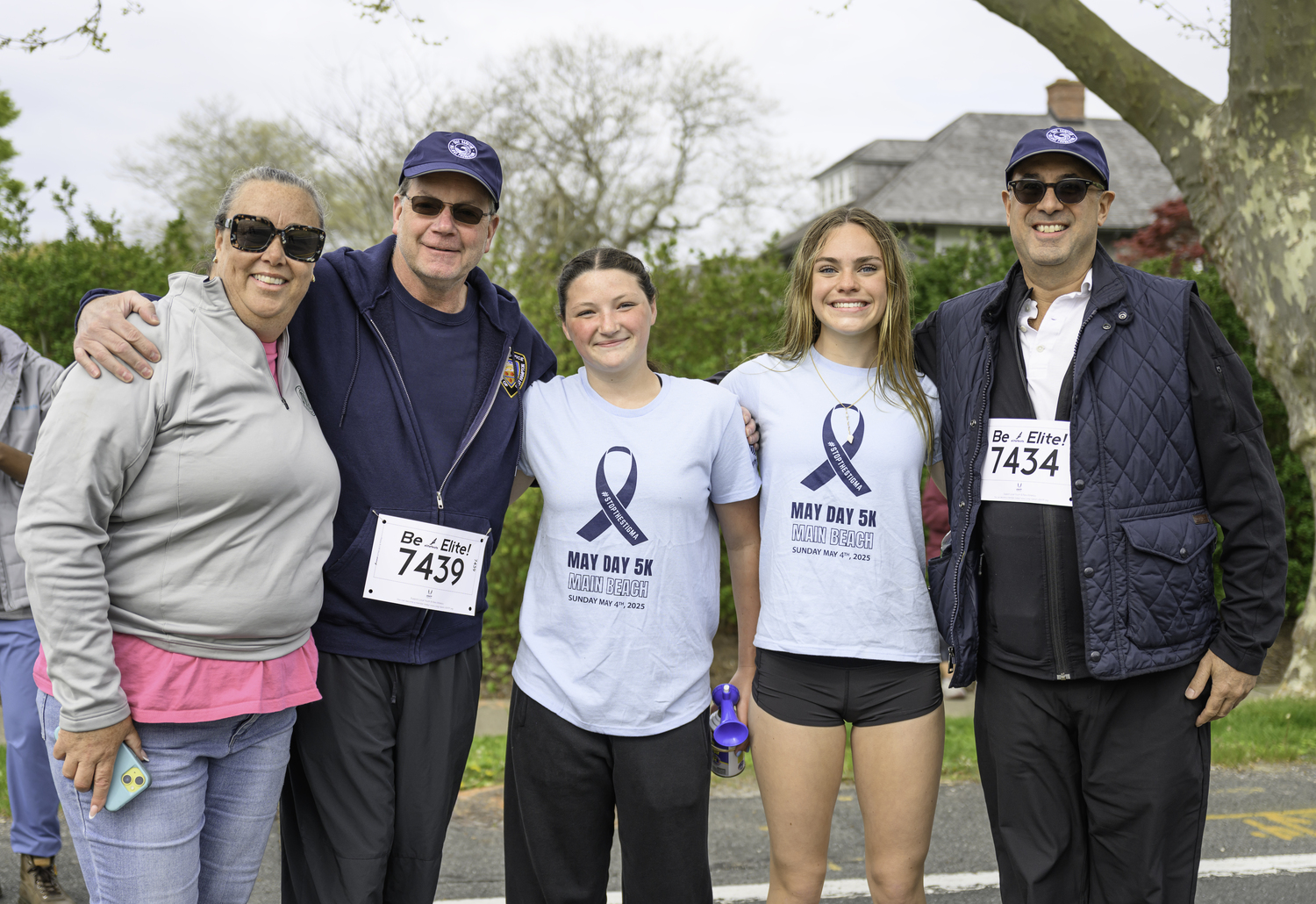 Race organizer Jennifer Fowkes, left, with East Hampton Village Mayor Jerry Larsen, race organizers Lucy Knight and Vanessa Rizzo and Bradford Billet.   MARIANNE BARNETT