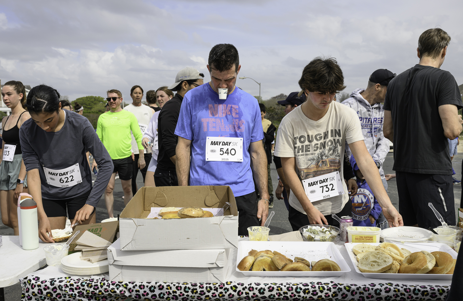 Finishers head to the snack table for some much needed nutrition.   MARIANNE BARNETT