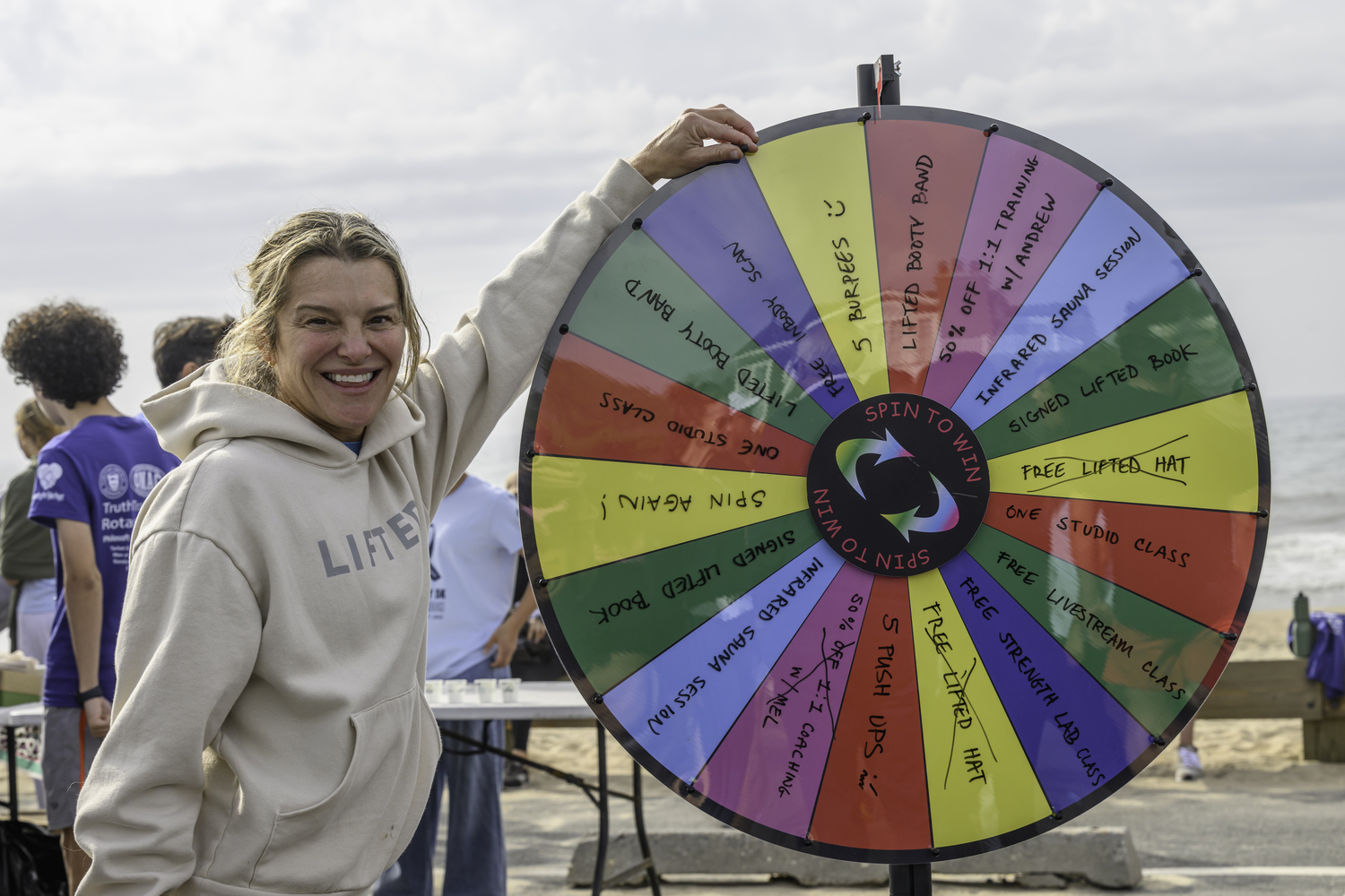 Participants could spin a wheel and win prizes on Sunday.   MARIANNE BARNETT