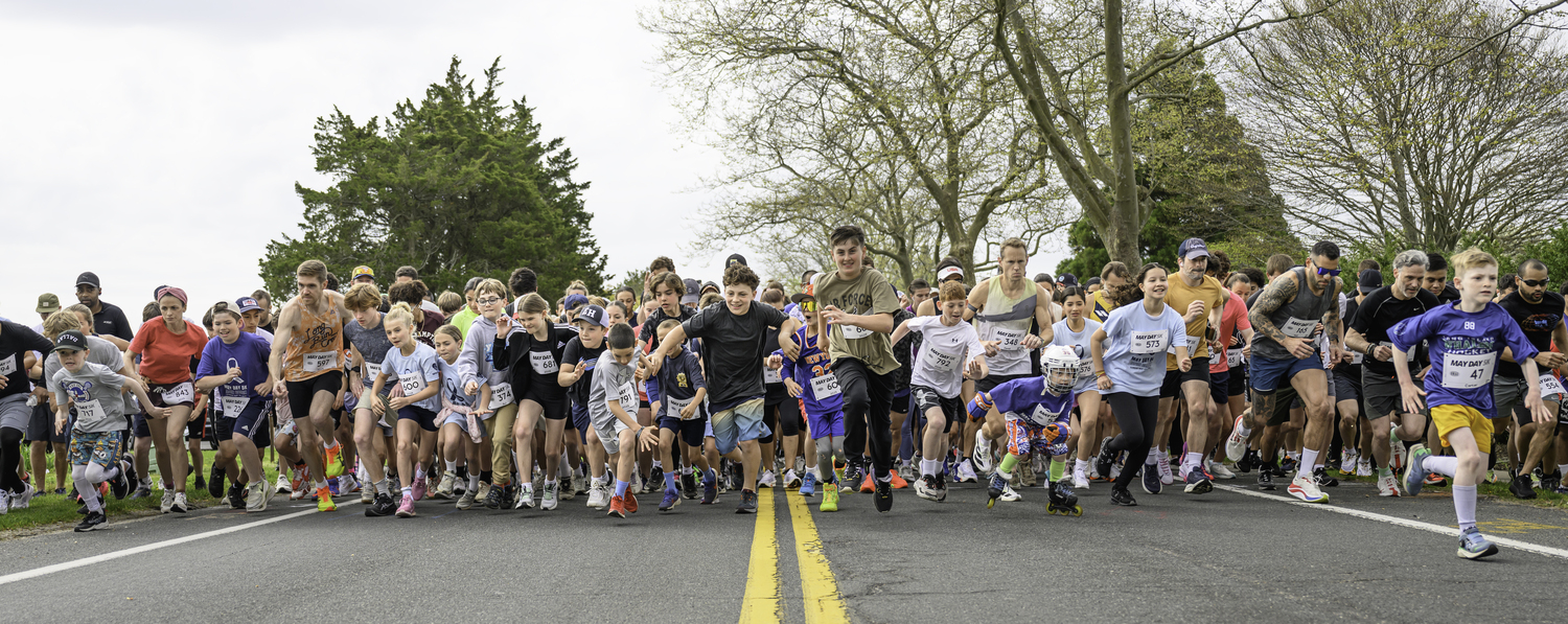 And they're off, for the start of the fourth annual May Day 5K at Main Beach, East Hampton, on Sunday morning.   MARIANNE BARNETT