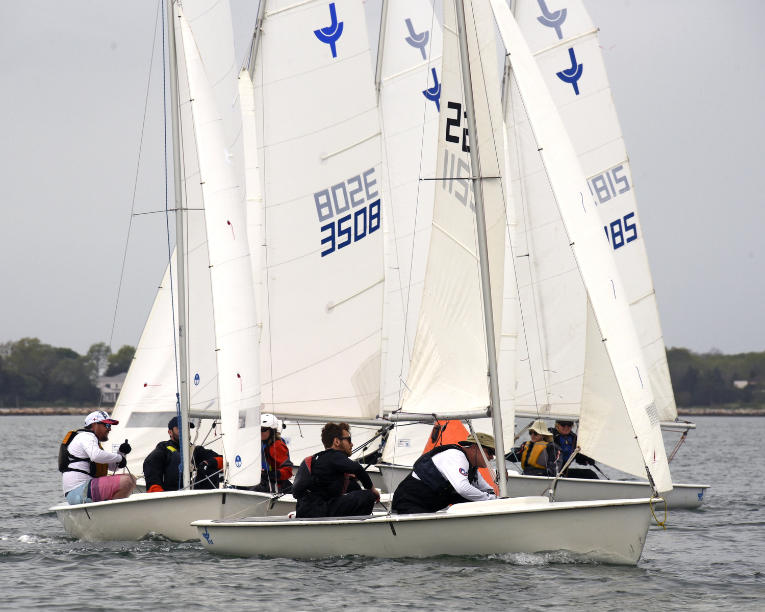 How many boats? Perhaps six with just inches between each of them. The weather mark is “buried” somewhere in the middle of the pack!  MICHAEL MELLA