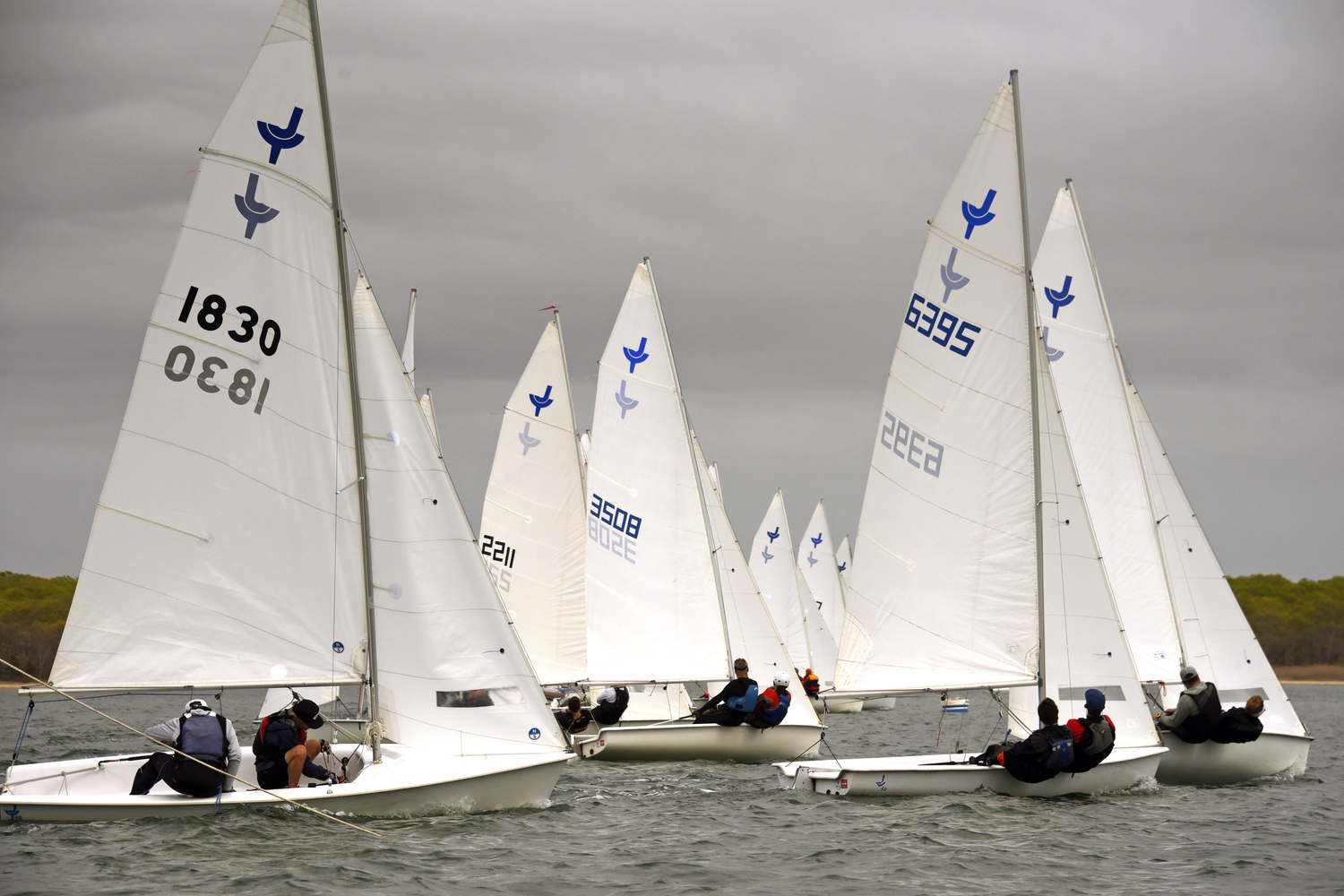 JY’s jockeying for position after the start in race number four. RC boat’s anchor line can be seen in the foreground. MICHAEL MELLA