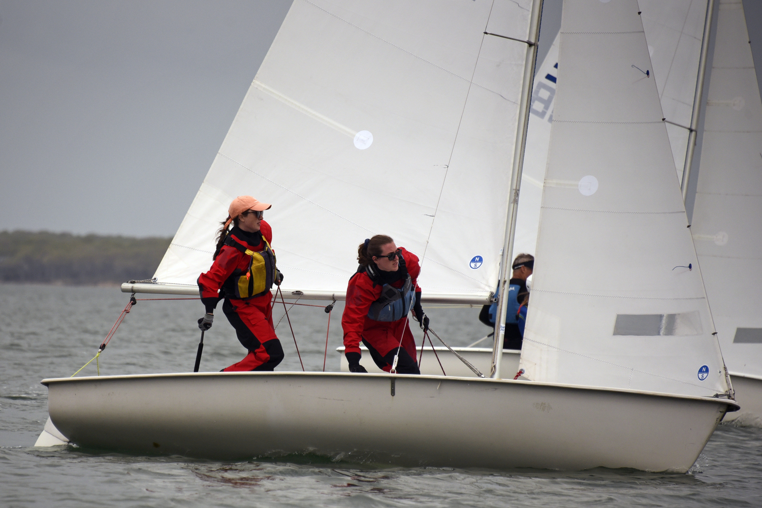 Charlotte LeClue at the helm with Ellie Goldberg “manning” the gybe sheet, poised for action.  MICHAEL MELLA