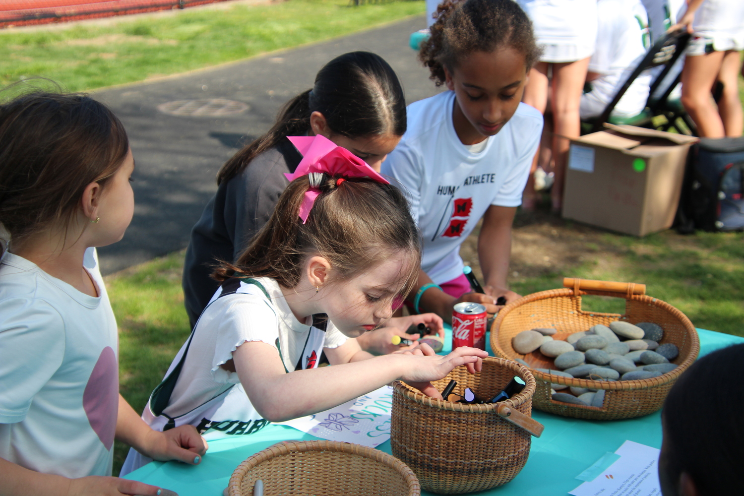Kindness rocks were decorated during Westhampton Beach's May 2 game against Rocky Point as part of a partnership between the girls lacrosse team and the nonprofit Morgan's Message, which focuses on mental health in athletics. MARY BEASLEY
