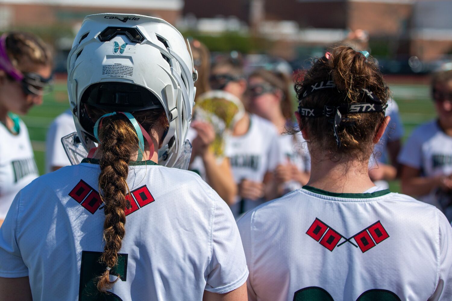 A Morgan's Message sticker on the back of senior goalkeeper Maya Farnan's helmet. TIM BEASLEY