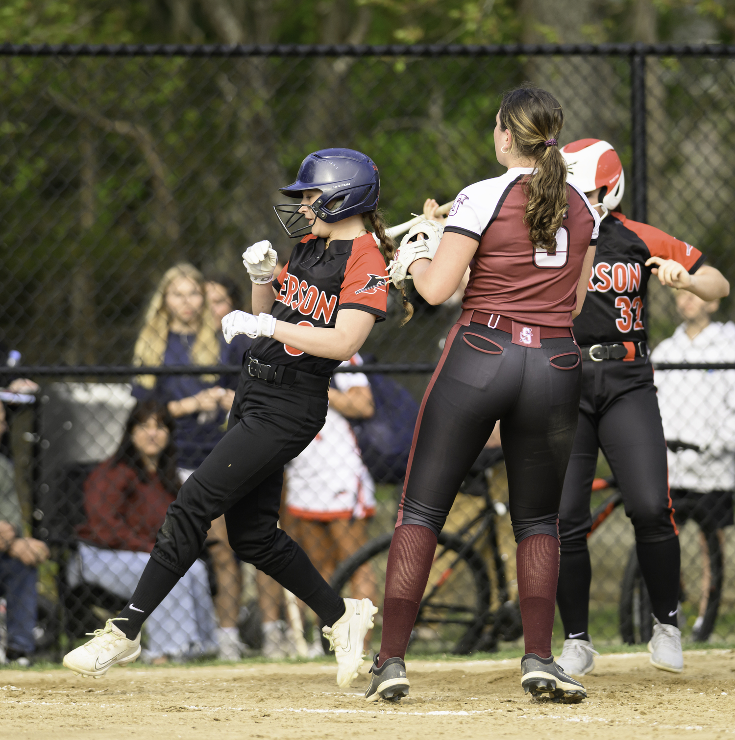Sofia Zappola scores a run.   MARIANNE BARNETT