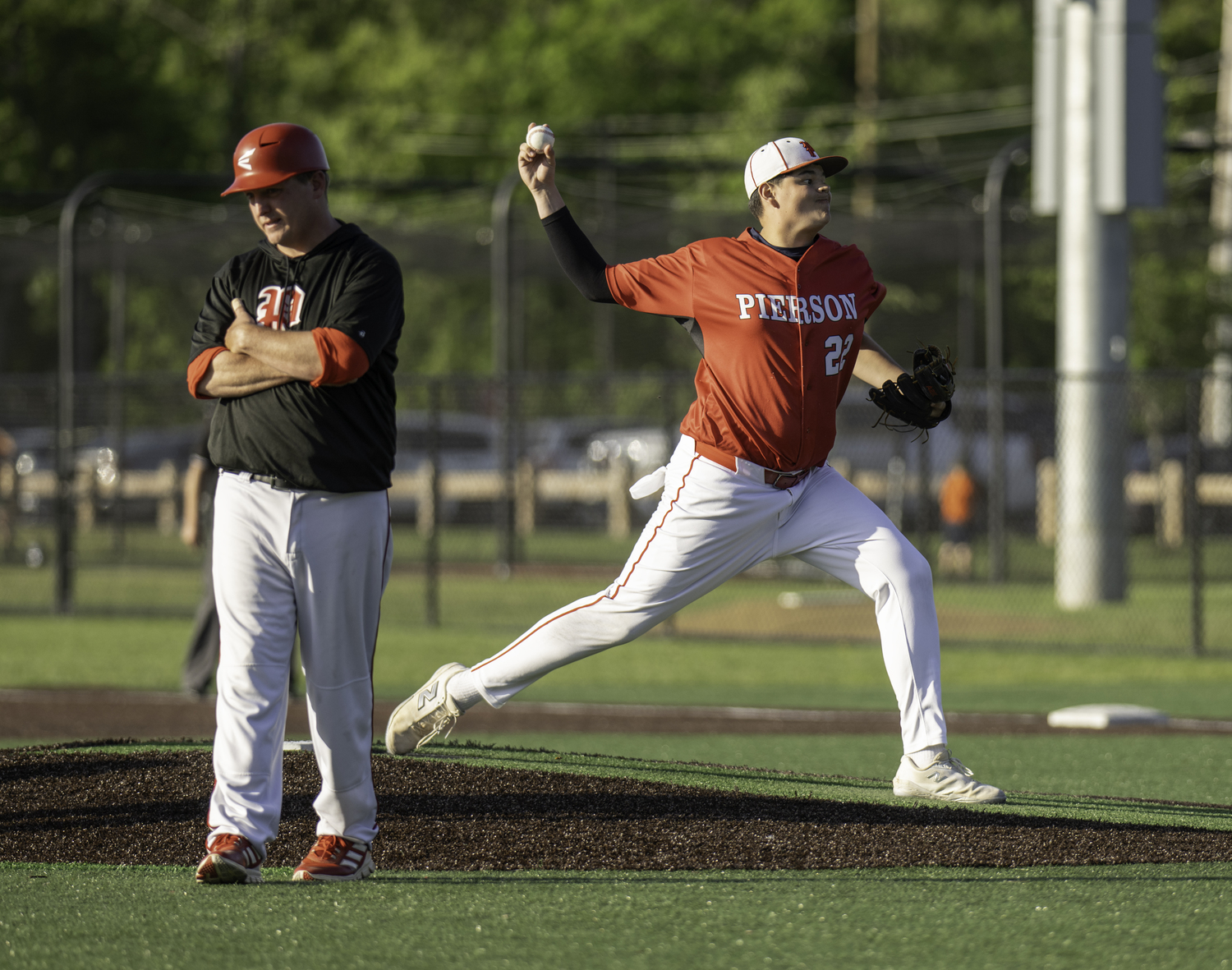 Senior first baseman Paul Roesel takes over on the mound. MARIANNE BARNETT