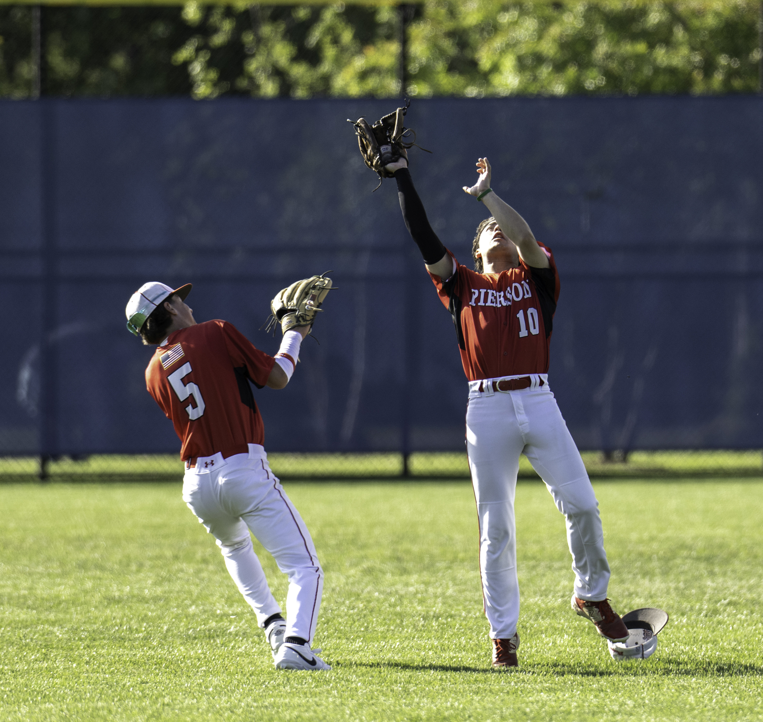 Pierson senior center fielder Max Krotman catches a fly ball.  MARIANNE BARNETT