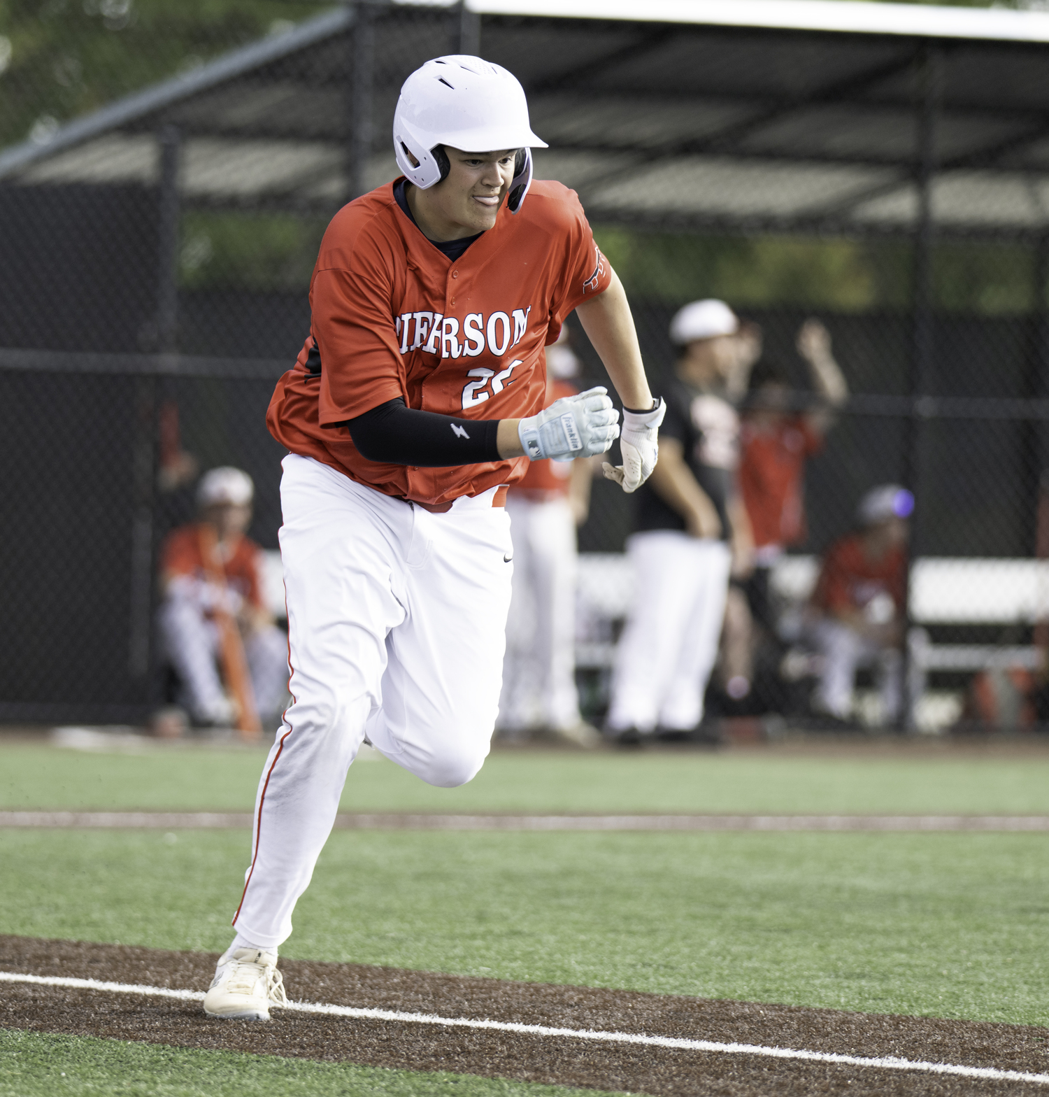 Paul Roesel heads down the first base line after putting a ball in play.   MARIANNE BARNETT