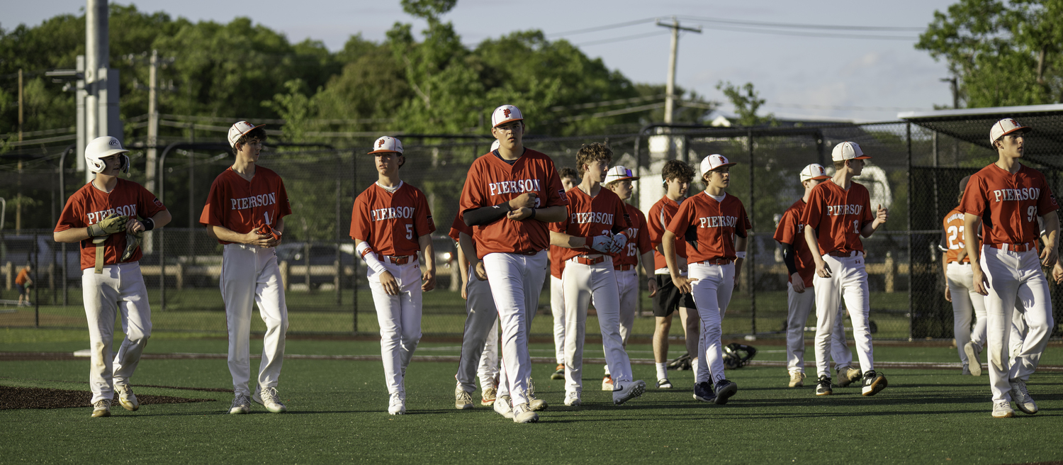 The Whalers walk off the field at Middle Country Park in Selden after a 6-0 loss to Babylon in game one of the Suffolk County Class B Championship on Monday.  MARIANNE BARNETT