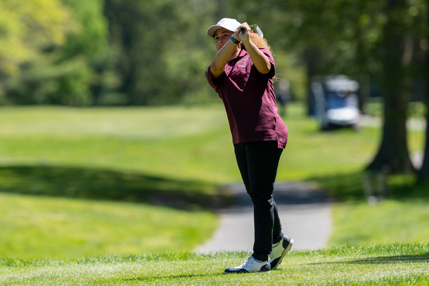 Zoe Coady plays at the Section XI Championships at Middle Island Country Club on Tuesday.  RON EPSOSITO