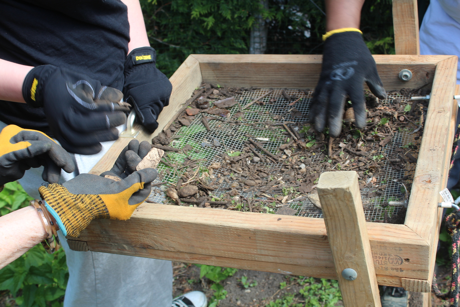 A screening box used to search for artifacts during the archeological dig at the Annie Cooper Boyd House on Saturday. ANNABELLE ROUSSEL