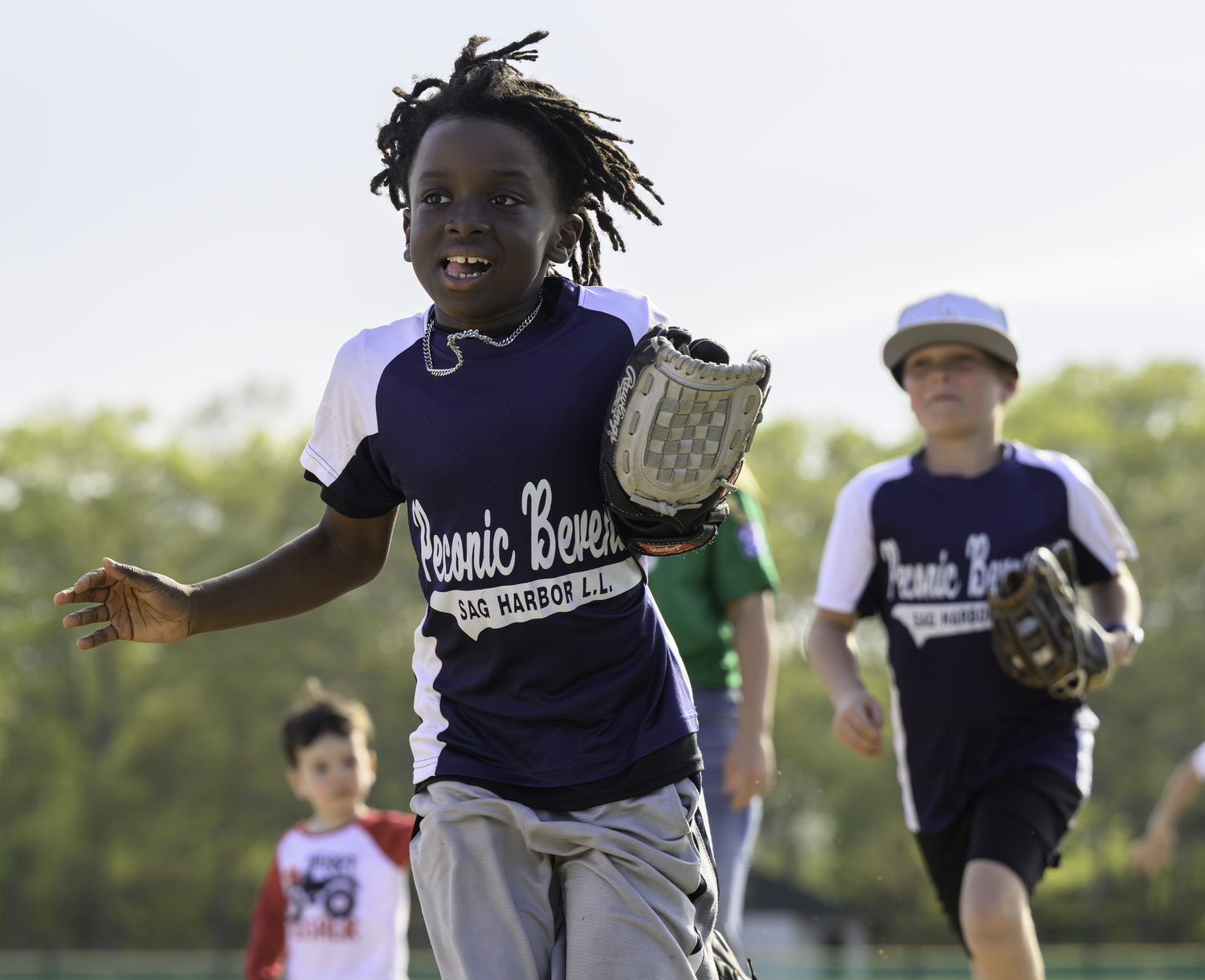 A member of the Peconic Beverage team of the Sag Harbor Little League.   MARIANNE BARNETT