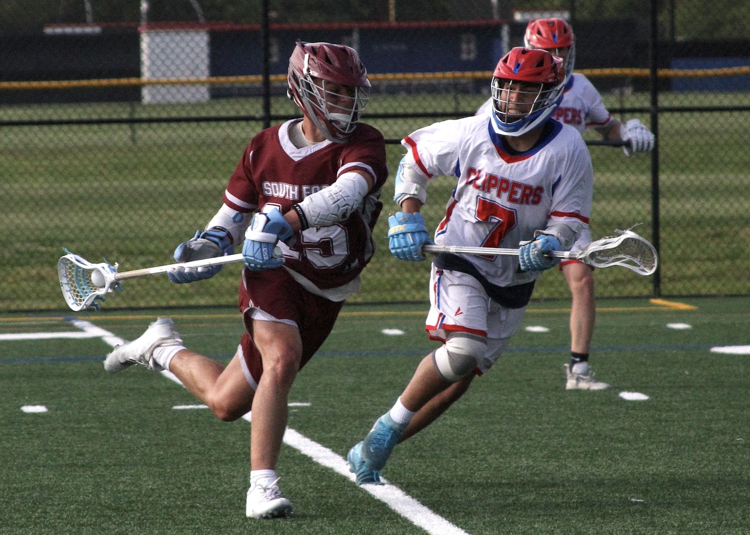 Hampton Bays sophomore Brayden Talmage winds up to fire a shot. DESIRÉE KEEGAN