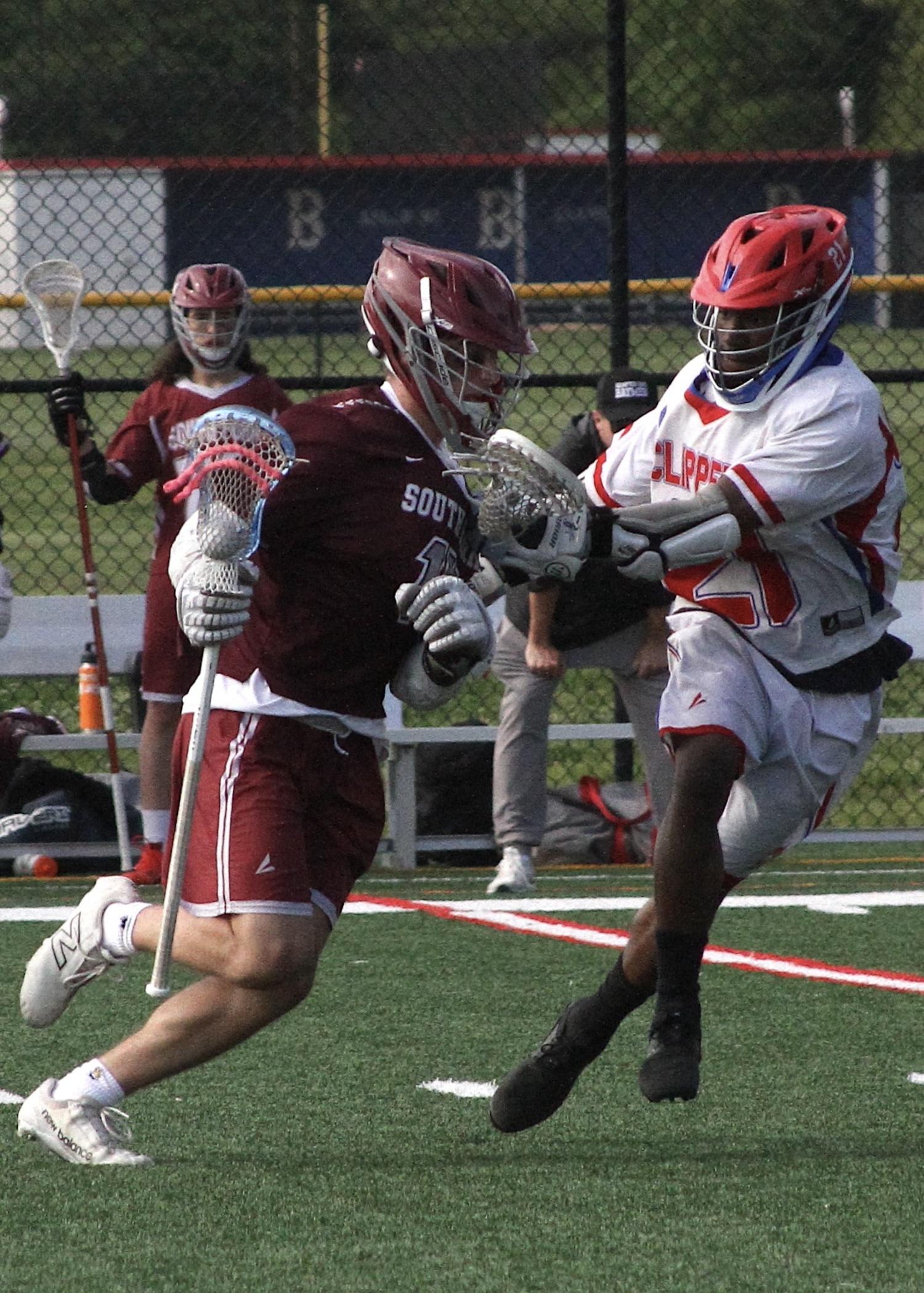 Hampton Bays sophomore Michael Single works his way through midfield. DESIRÉE KEEGAN