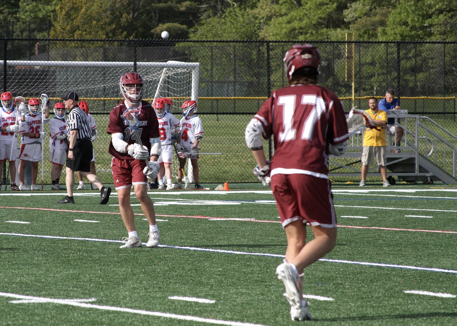 Hampton Bays sophomore Michael Single passes the ball to East Hampton sophomore Zane Karoussos. DESIRÉE KEEGAN