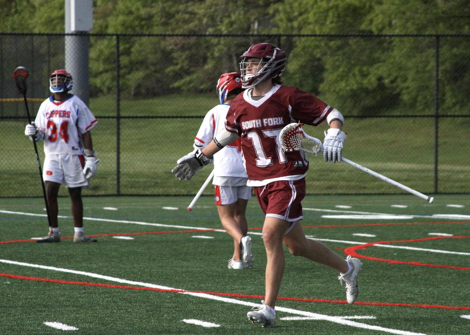 East Hampton sophomore Zane Karoussos celebrates a goal. DESIRÉE KEEGAN