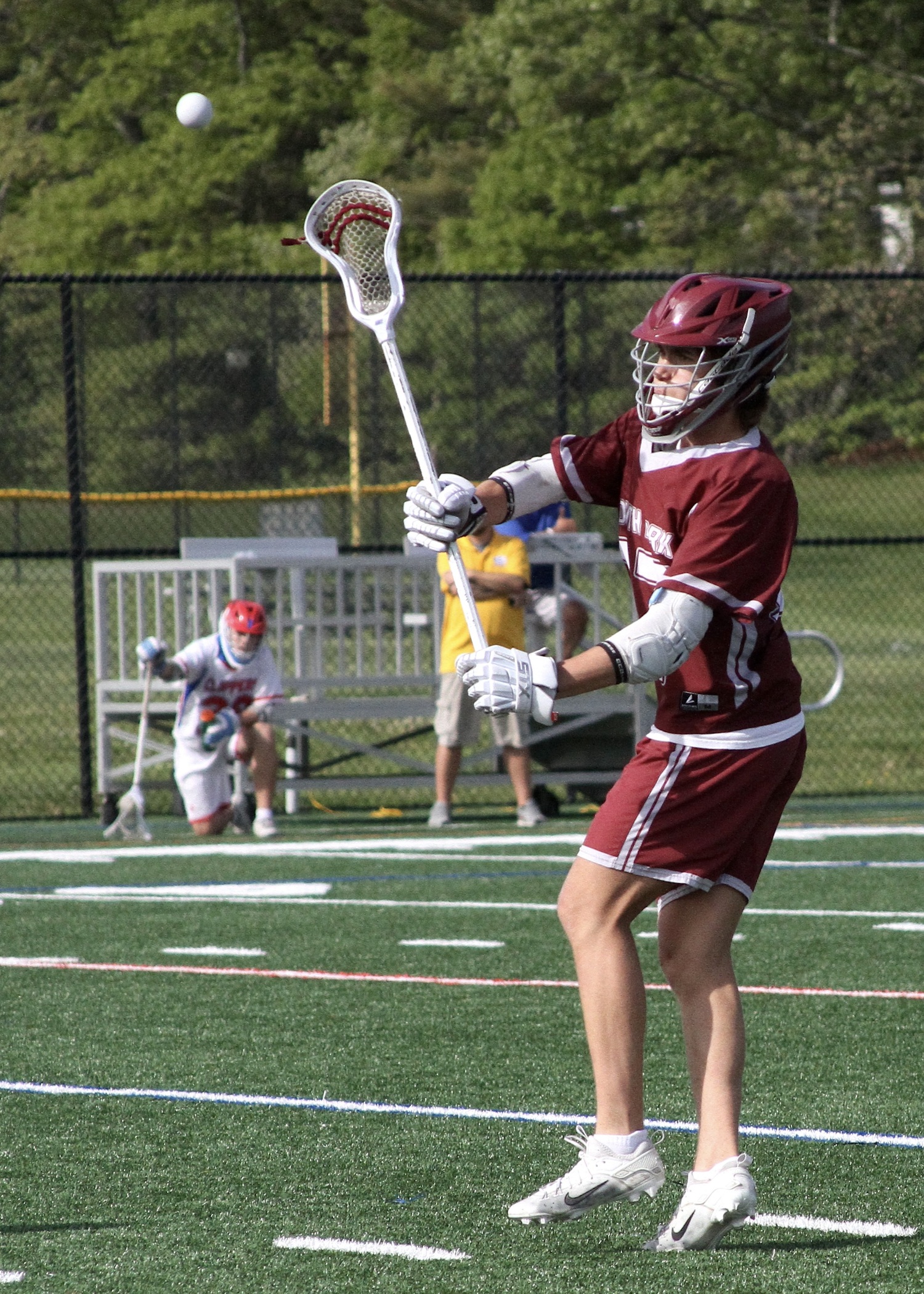 East Hampton sophomore Zane Karoussos makes a pass. DESIRÉE KEEGAN