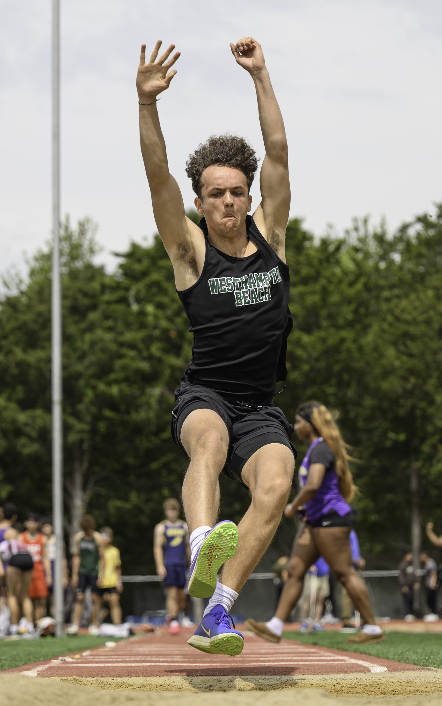 Ezekiel McCrary competing in the long jump of the pentathlon in which he placed second overall in.   MARIANNE BARNETT